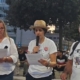 Aurore Thiébaut au micro lors du rassemblement de Milan, le 11 septembre 2026